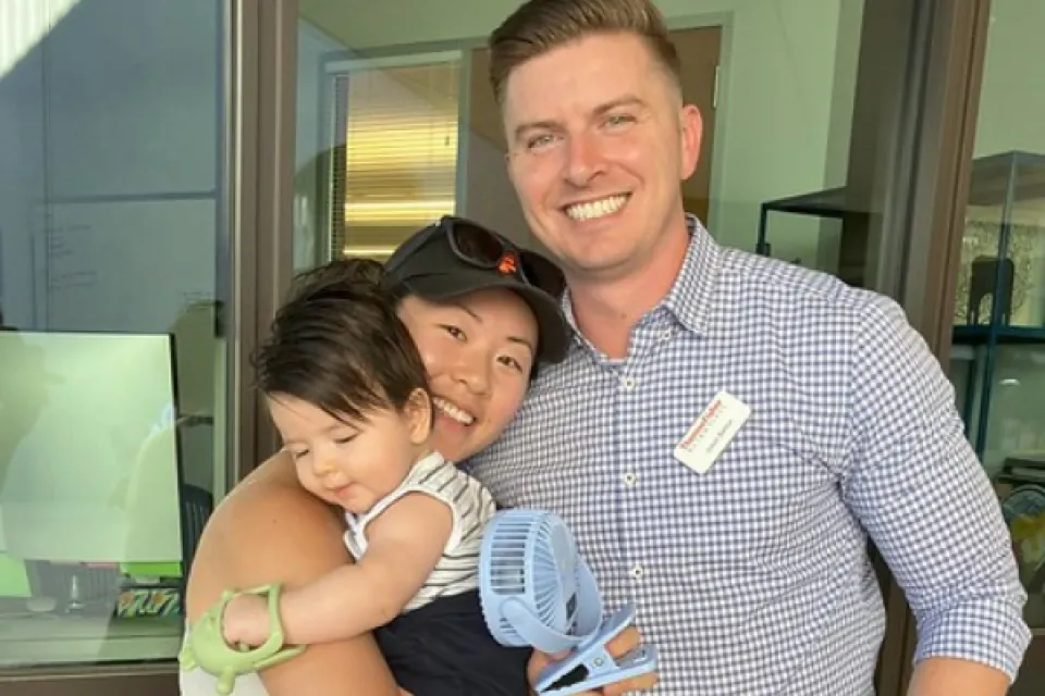 Jason Bartus with wife and son