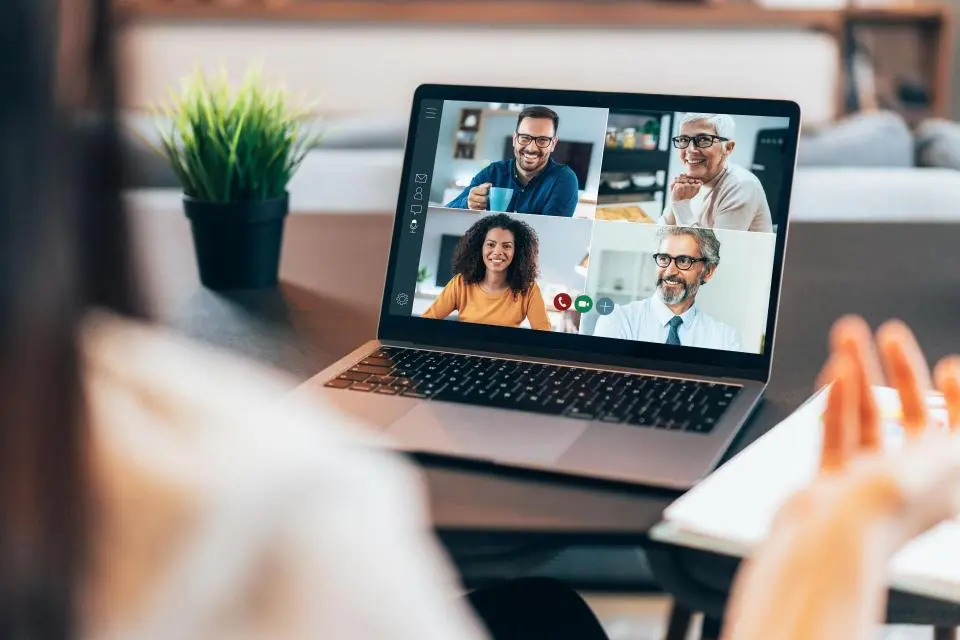 A laptop with a group of people on it